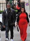  photo Kim-Kardashian-pregnant-Wore-a-Long-Red-Dress-with-Kanye-West-in-Paris_zps1037bd4a.jpg