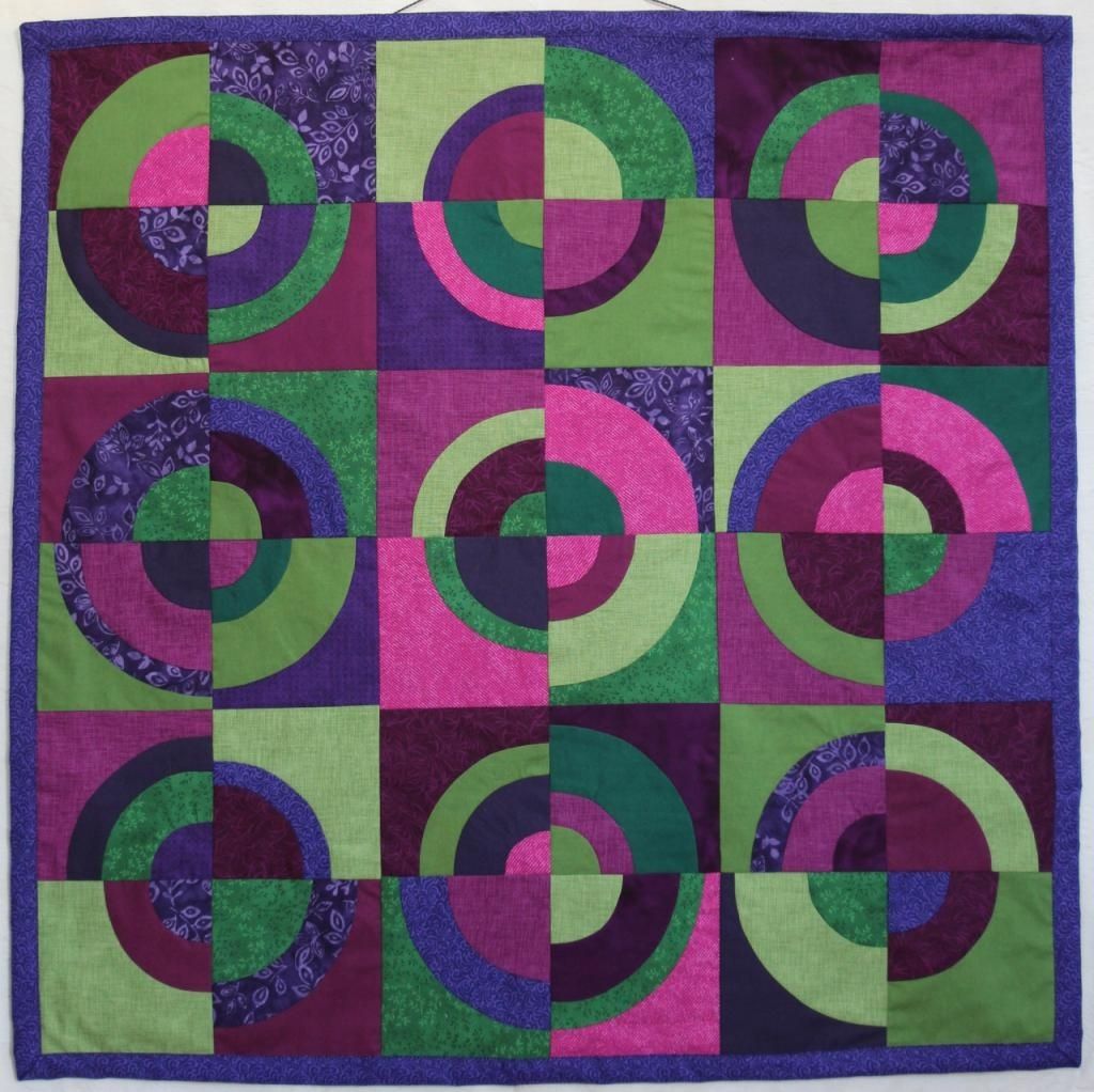 green and purple quilt